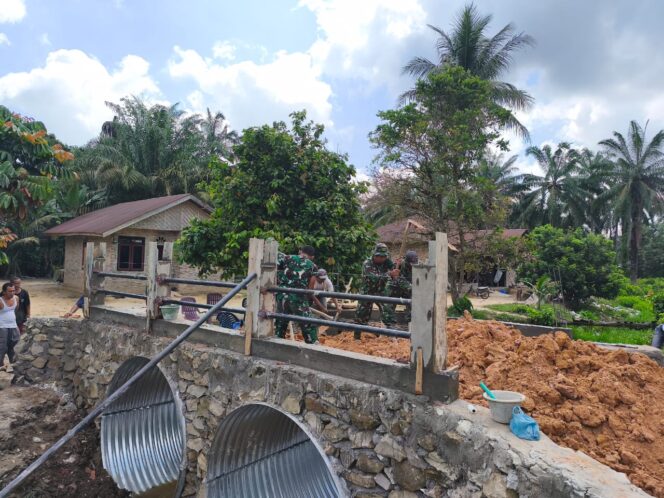 
					Kodim 0209/Labuhanbatu Tuntaskan Pembangunan Jembatan Aramco di Desa Tanjung Pasir