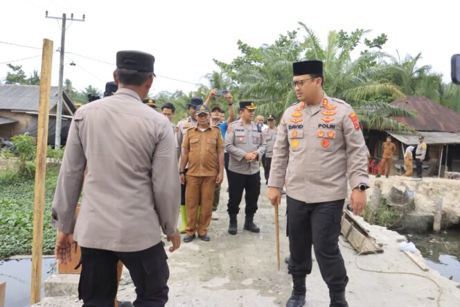 
					Kapolres Langkat Tinjau Langsung Renovasi Jembatan Merah Putih Sang Bhayangkara di Secanggang